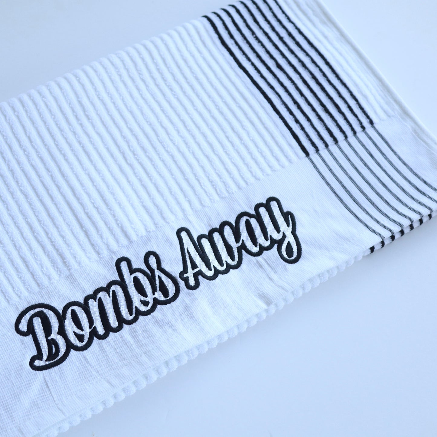 White/Black Bombs Away Caddy Golf Towel