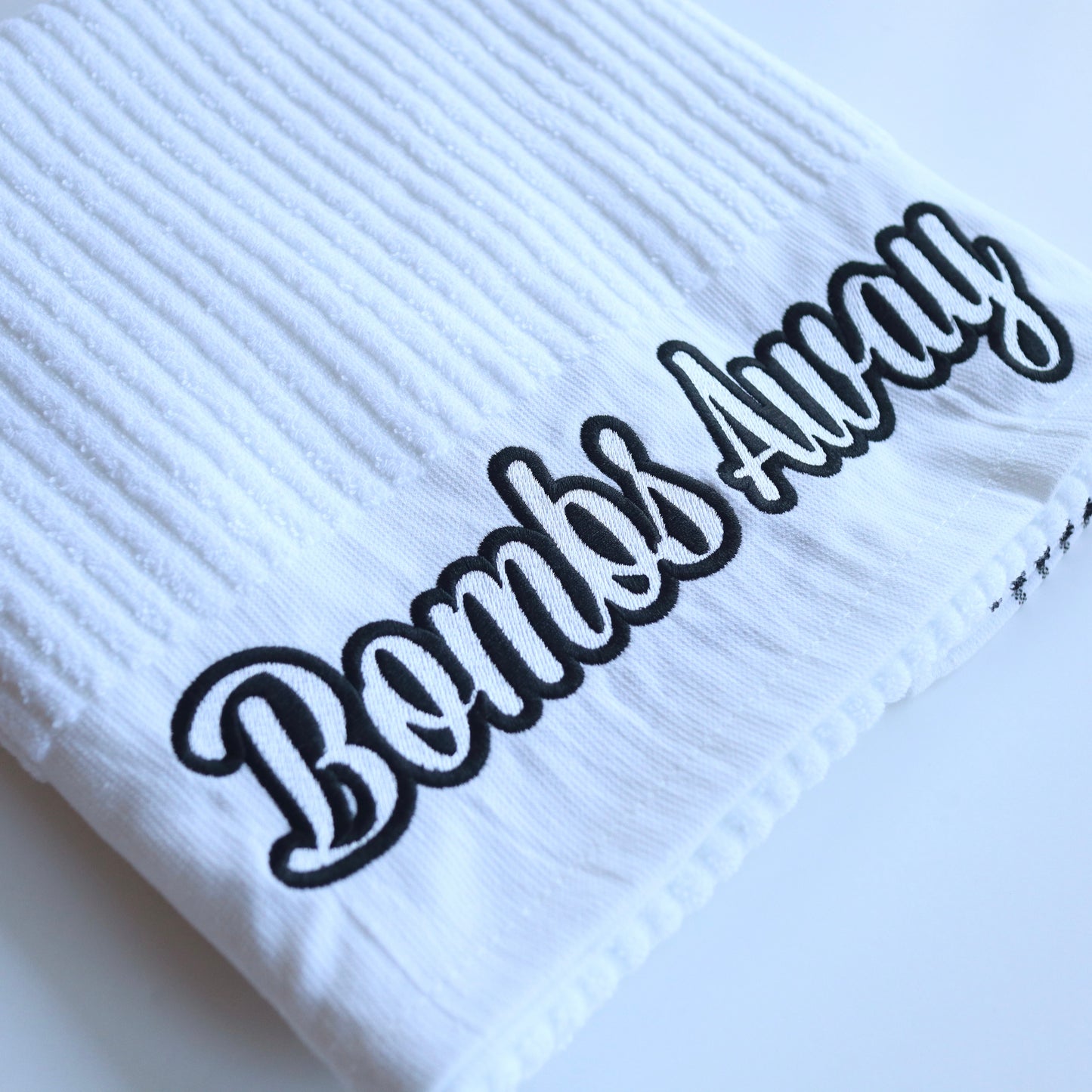 White/Black Bombs Away Caddy Golf Towel