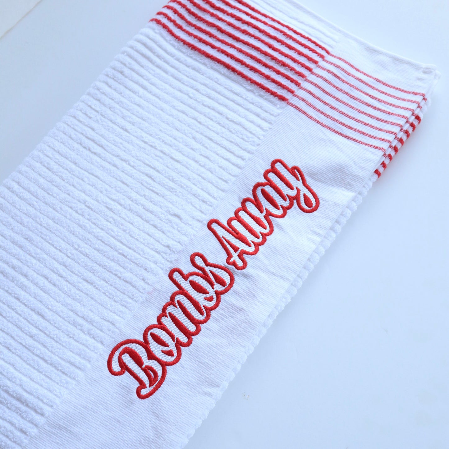 White/Red Bombs Away caddy golf towel